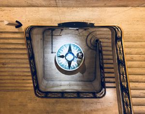 Looking down the at the pendulum from the top of the staircase at the Franklin Institute