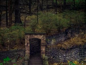 An archway along the side of Kelly Drive in Philadelphia, with stairs leading through Fairmount Park